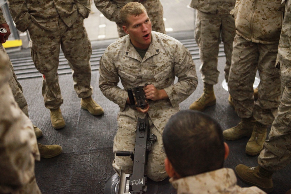 Marines with Task Force Denali receive an M240 machine gun class