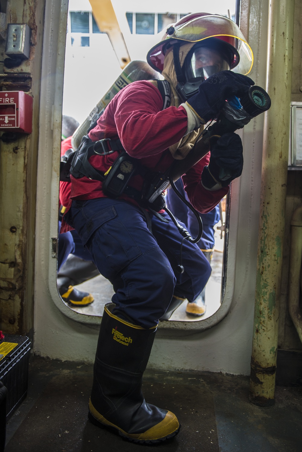 Coast Guardsmen teach damage control techniques