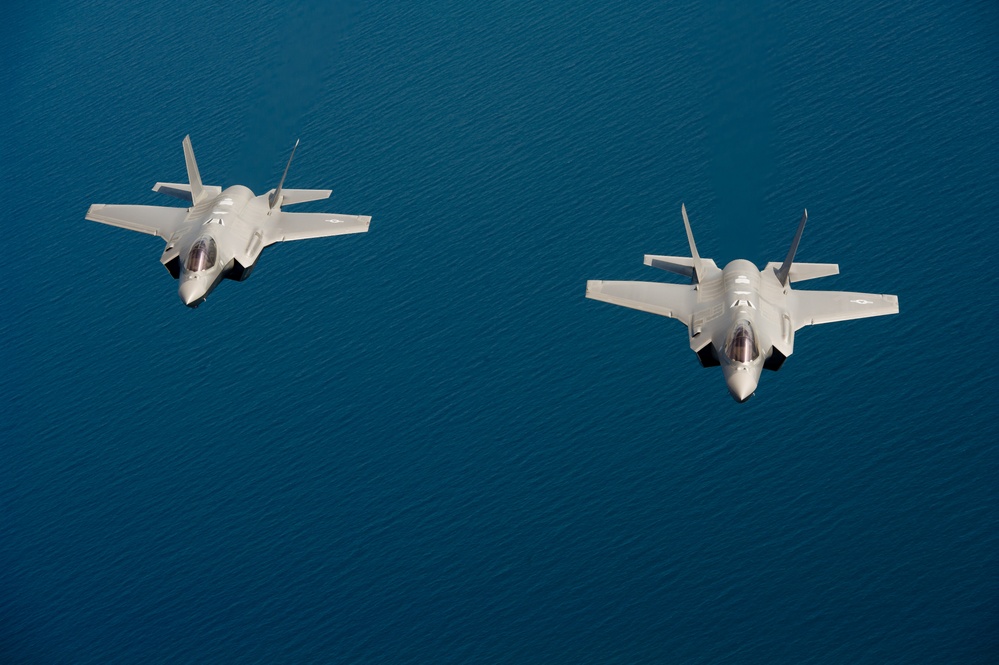 F-35 Lightning II instructor pilots conduct aerial refueling