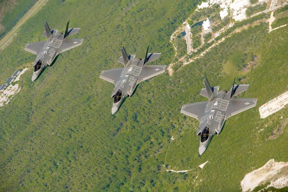 F-35 Lightning II instructor pilots conduct aerial refueling