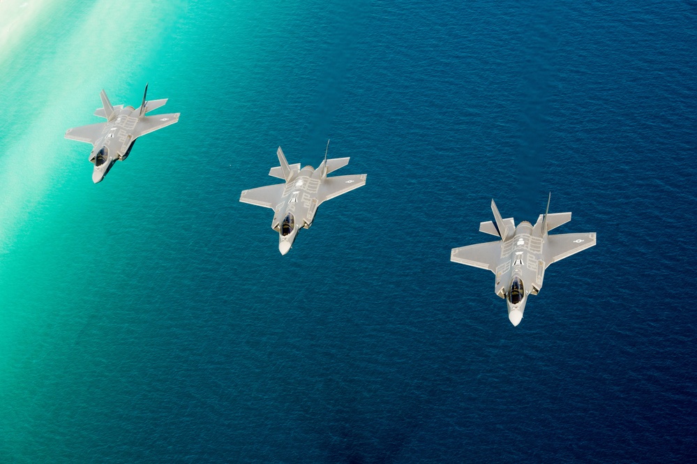 F-35 Lightning II instructor pilots conduct aerial refueling