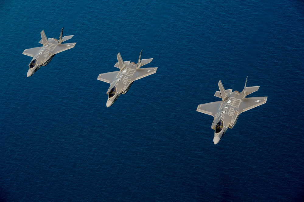 F-35 Lightning II instructor pilots conduct aerial refueling