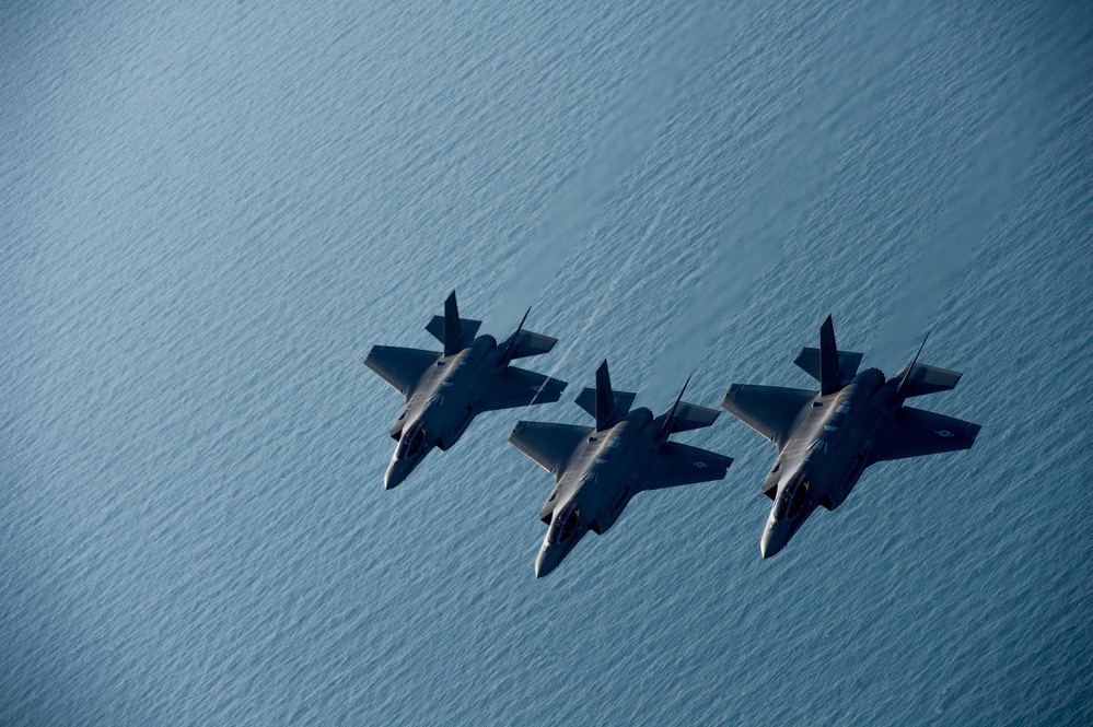 F-35 Lightning II instructor pilots conduct aerial refueling