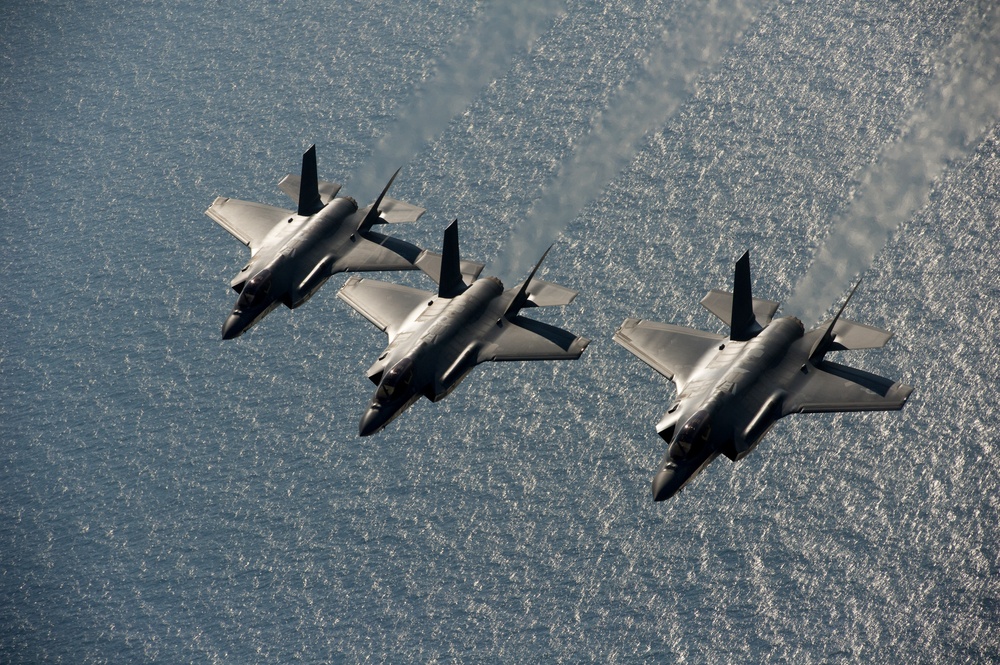 F-35 Lightning II instructor pilots conduct aerial refueling