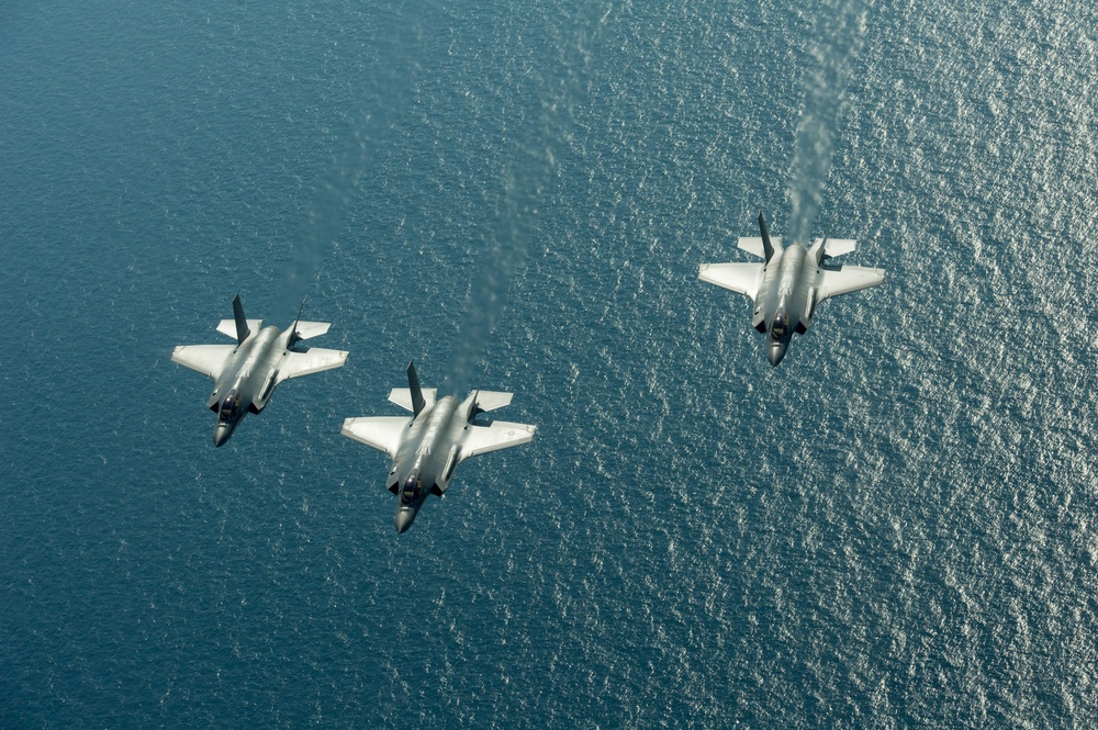 F-35 Lightning II instructor pilots conduct aerial refueling