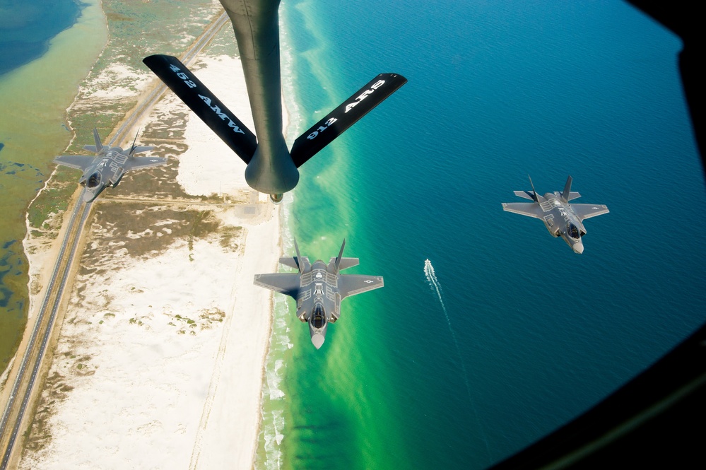 F-35 Lightning II instructor pilots conduct aerial refueling