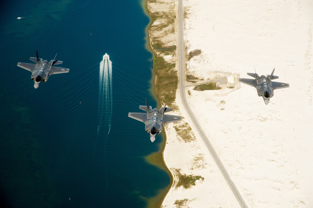 F-35 Lightning II instructor pilots conduct aerial refueling