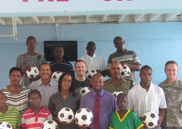 USAID-sponsored Boys Training Centre hosts USCGC Oak crew for futbol match