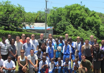 USAID-sponsored Boys Training Centre hosts USCGC Oak crew for futbol match