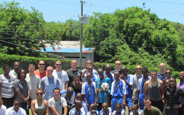 USAID-sponsored Boys Training Centre hosts USCGC Oak crew for futbol match