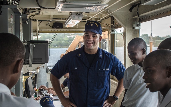 Touring the bridge of the US Coast Guard Cutter Oak