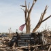 Retired Guardsman marks May 20 tornado site with battle-worn flag