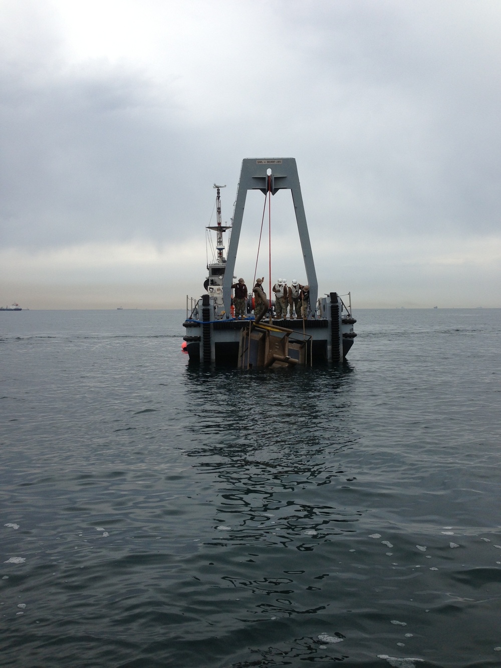 Warping tug salvages 3-ton bow chute during CJLOTS 13