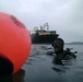 UCT TWO Seabee divers preparing to salvage fallen equipment during CJLOTS 13
