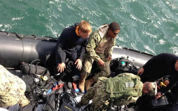 Members of UCT TWO prepare to dive with their ROK Navy counterparts