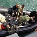 Members of UCT TWO prepare to dive with their ROK Navy counterparts