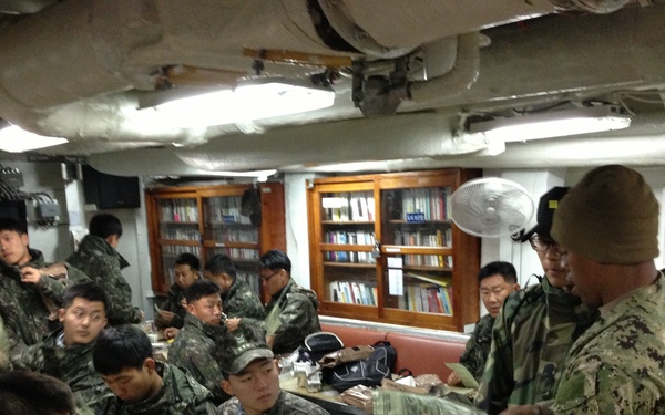 US Navy members share MREs with their ROK Navy counterparts during CJLOTS 13