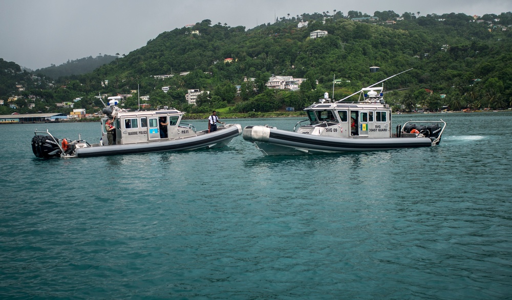Coast Guard Interceptors from Saint Vincent and the Grenadines and Saint Lucia pass each other near the Port of Castries during training as part of Tradewinds 2013