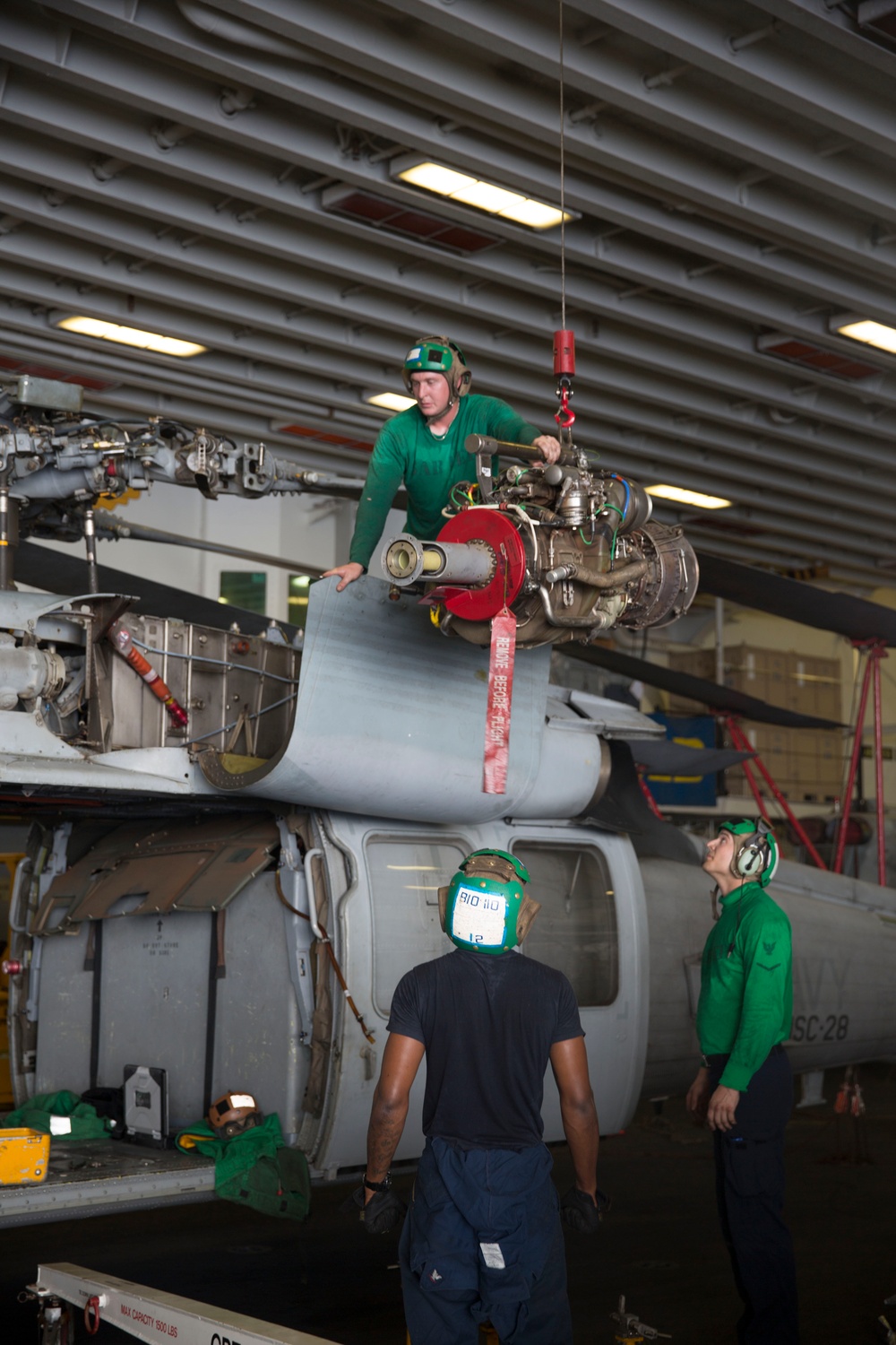 Maintenance on helicopter