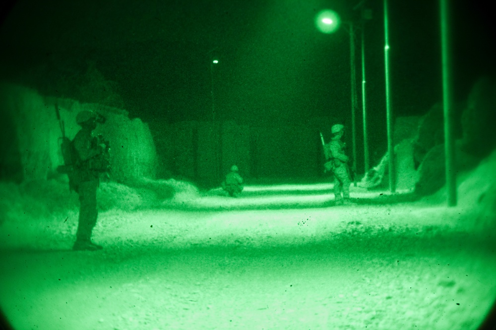 U.S. Marines with Lima Company, 3rd Battalion, 4th Marines Conduct a Night Patrol