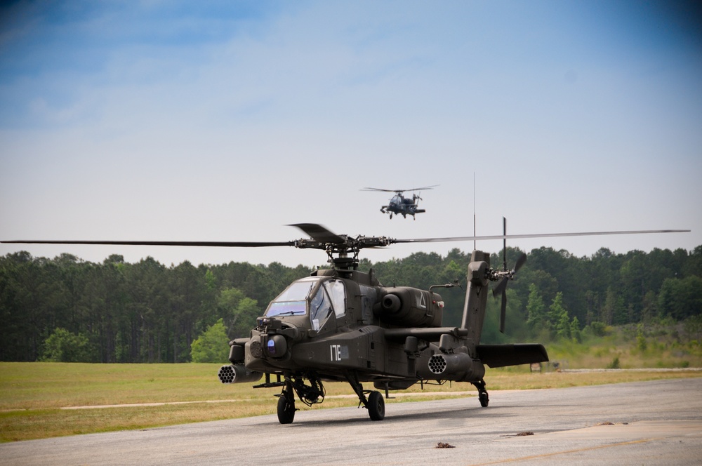 Apache aircraft taxis into parking area