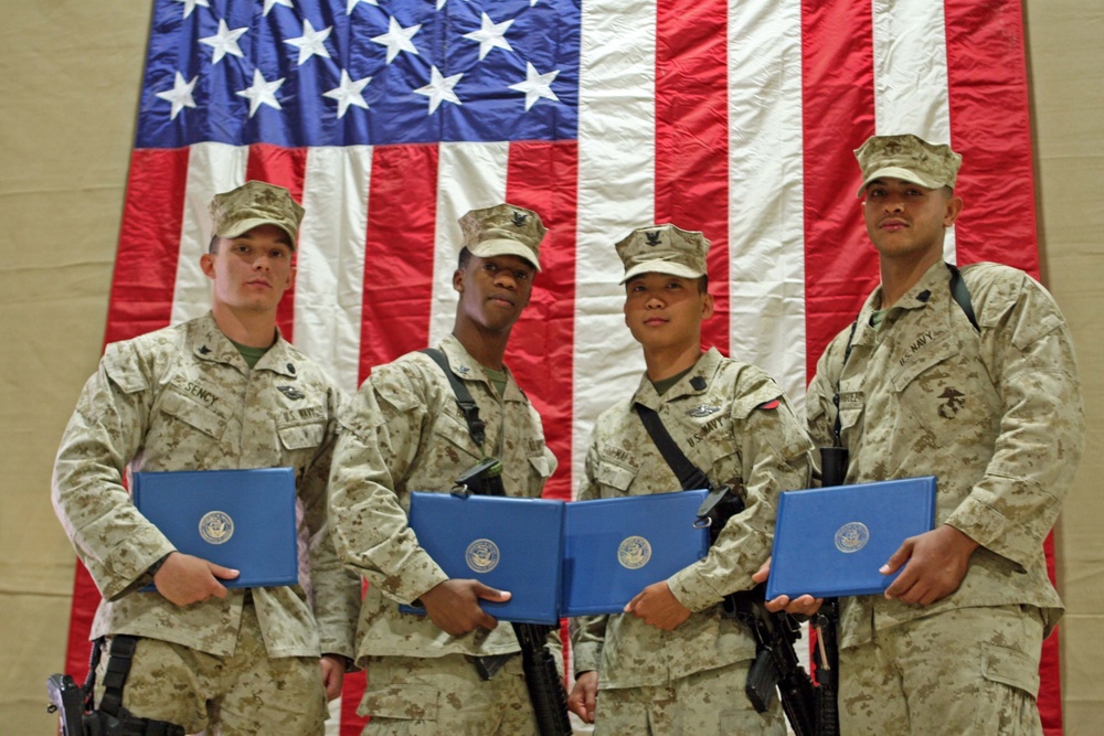 Sailors graduate leadership course, advance their military career