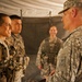 Sergeant major of the Army gives coins of excellence to EFMB recipients