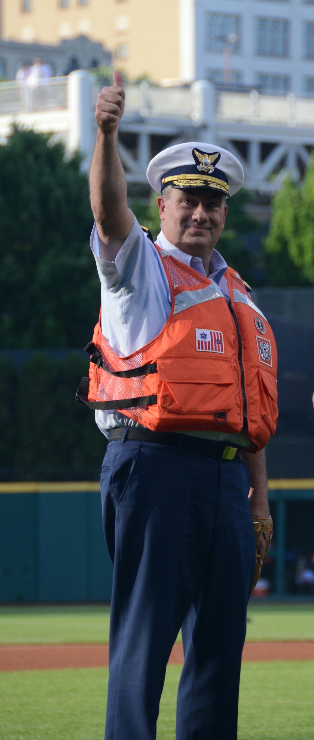 Rear Adm. Parks tosses first pitch