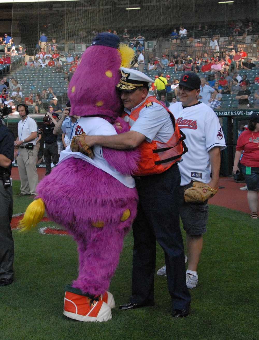 Rear Adm. Parks greeted by mascot