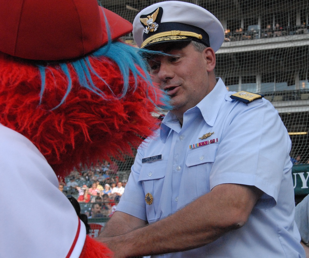 Rear Adm. Parks greets mascot