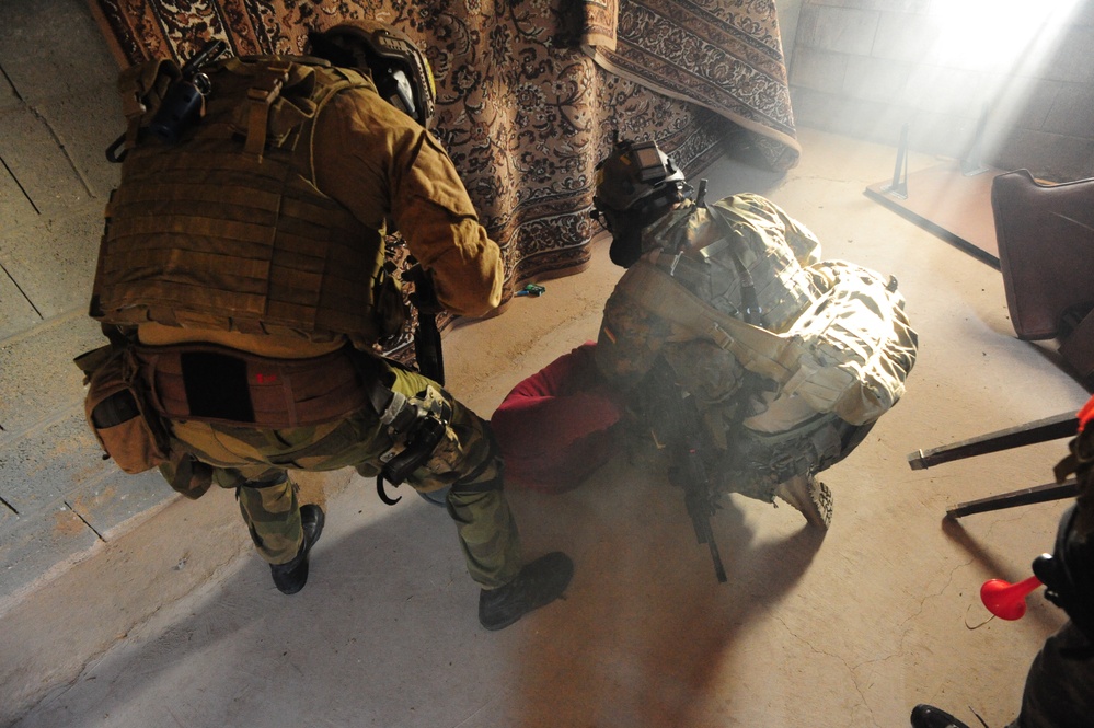 Multinational students attend the International Spcial Training Centre's Advance Close Quarter Battle Course