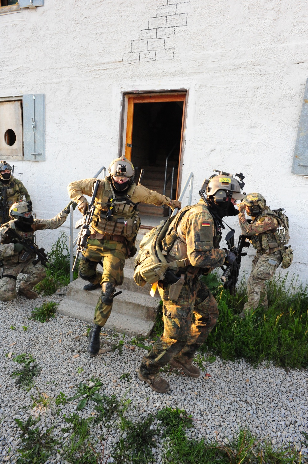 Multinational students attend the International Spcial Training Centre's Advance Close Quarter Battle Course
