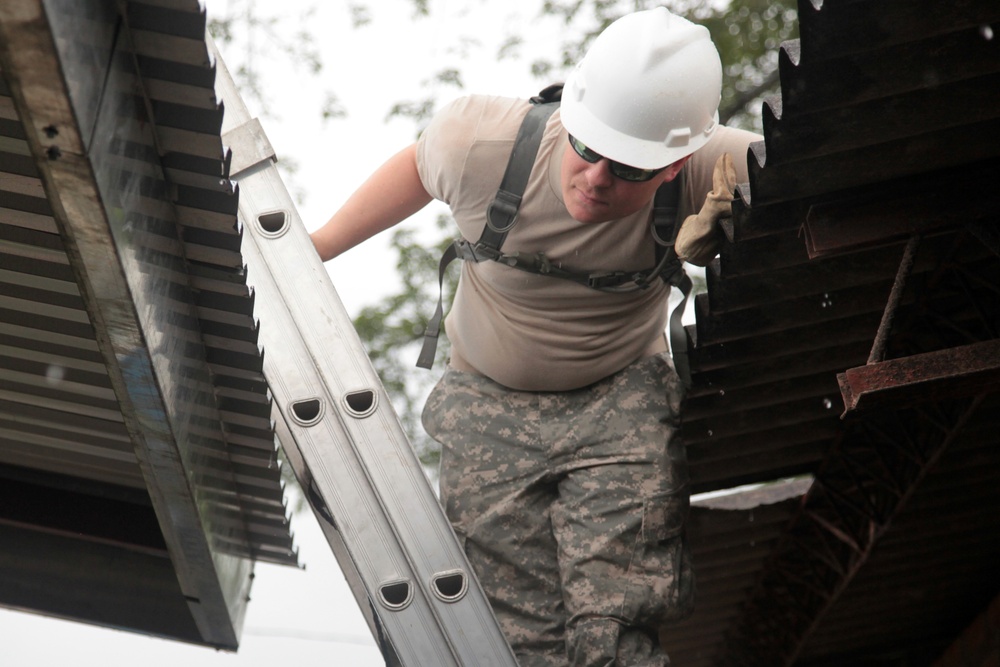 Joint Task Force Jaguar soldiers build schools