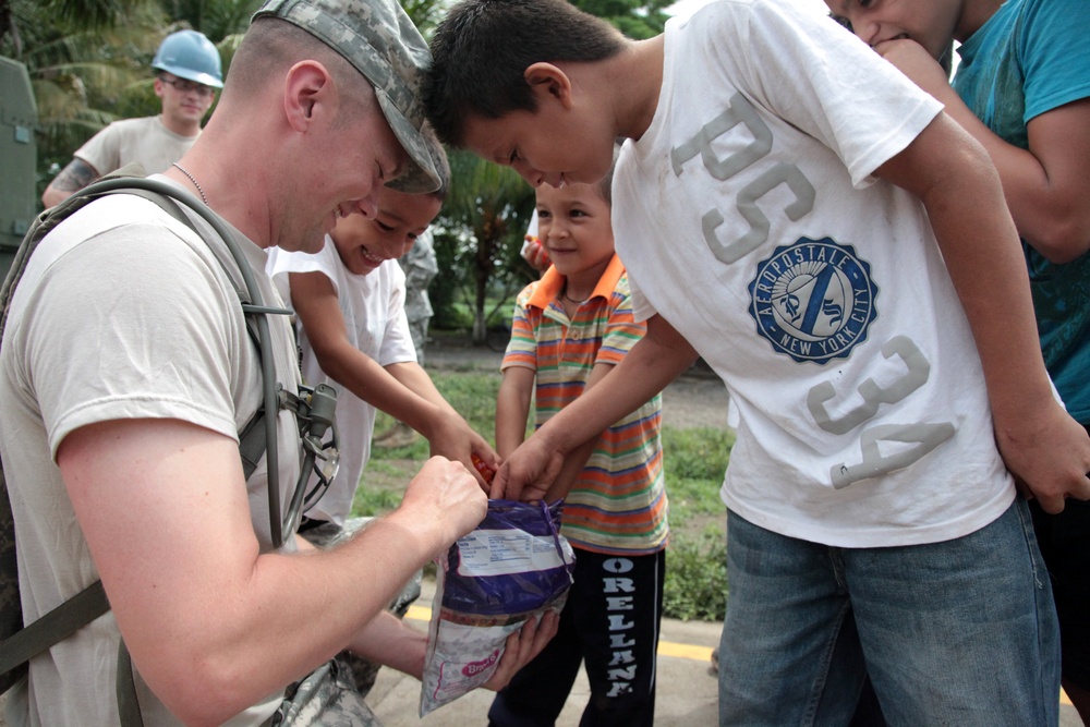 Joint Task Force Jaguar soldiers build latrine for school