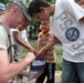 Joint Task Force Jaguar soldiers build latrine for school