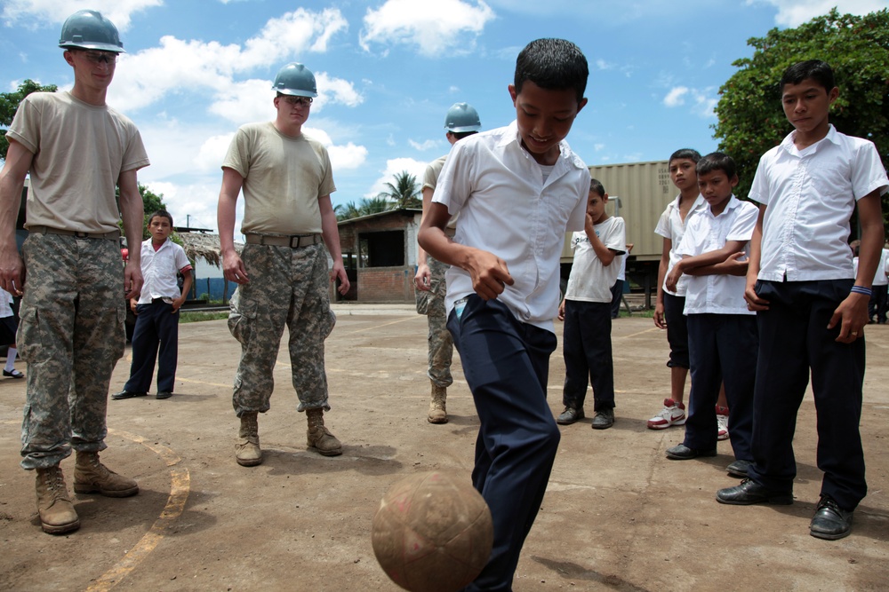 Joint Task Force Jaguar soldiers build latrine for school