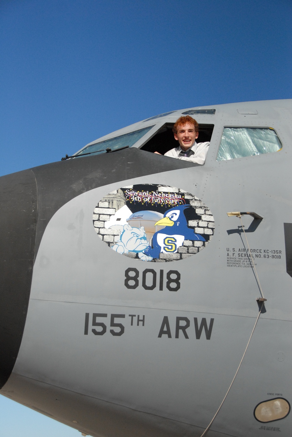 Graduated Seward High School student unveils graphic design nose art on KC-135