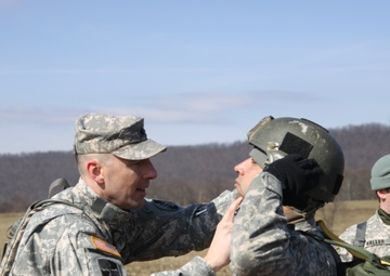 Lt. Col. Bradley Martsching, 1st Squadron, 158th Cavalry Regiment commander and a qualified jumpmaster, performs a Jumpmaster Personnel Inspection