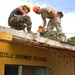 New Horizons repairs Hattieville Government Pre-School roof