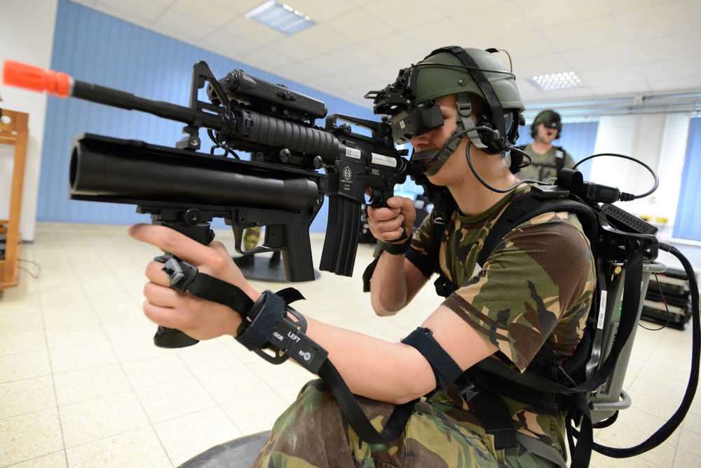 Soldiers from the Netherlands army conduct training in a Dismounted Soldier Training System (DSTS) at the 7th US Army Joint Multinational Training Command (JMTC)