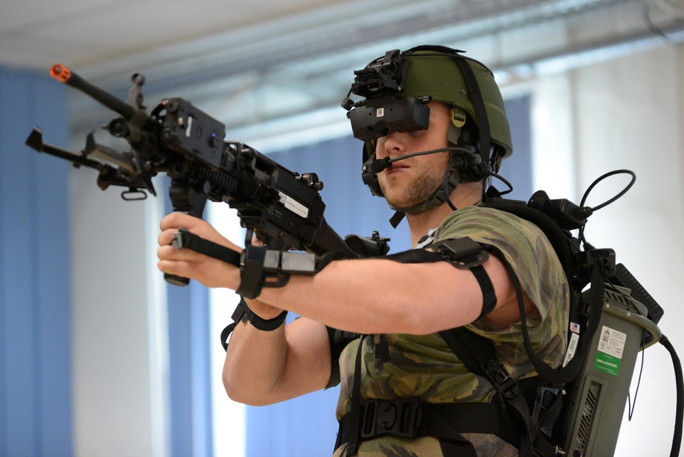 Soldiers from the Netherlands army conduct training in a Dismounted Soldier Training System at the 7th US Army Joint Multinational Training Command