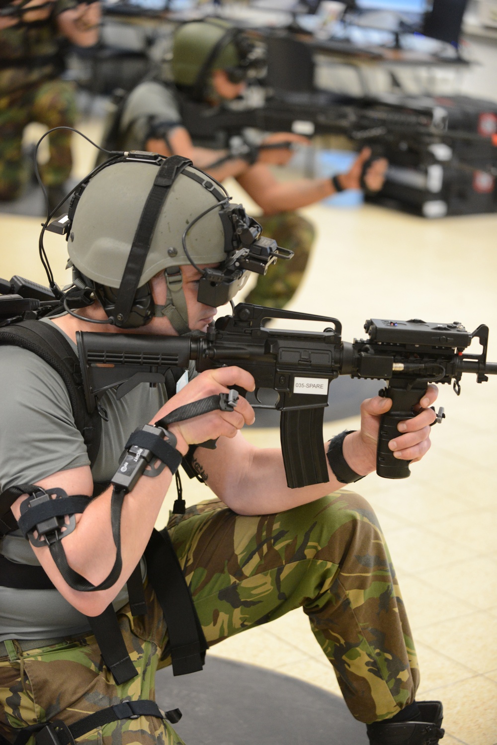 Soldiers from the Netherlands army conduct training in a Dismounted Soldier Training System at the 7th US Army Joint Multinational Training Command