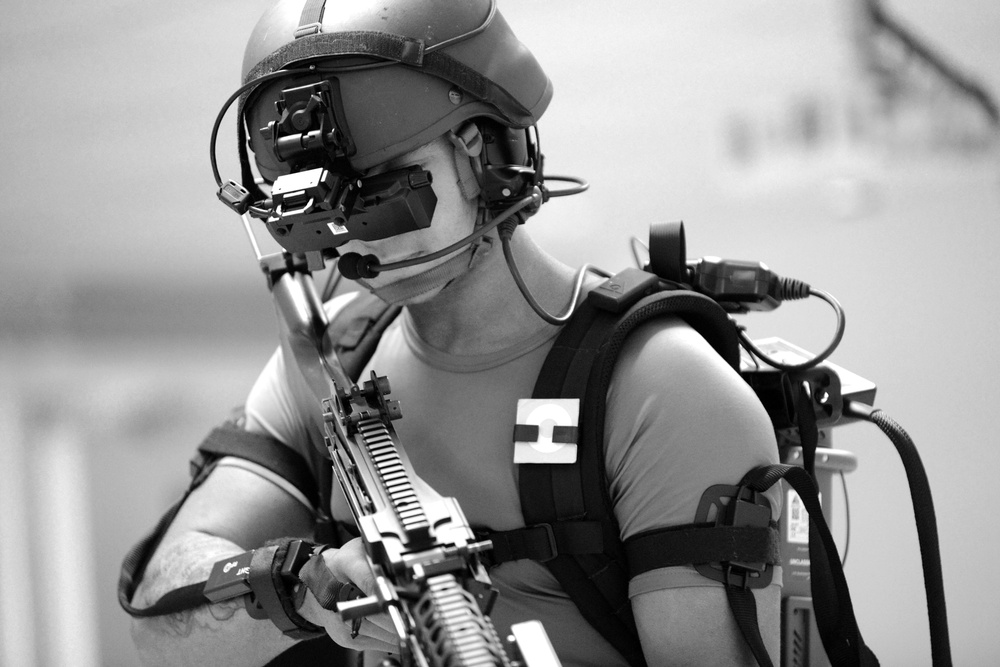 Soldiers from the Netherlands army conduct training in a Dismounted Soldier Training System at the 7th US Army Joint Multinational Training Command