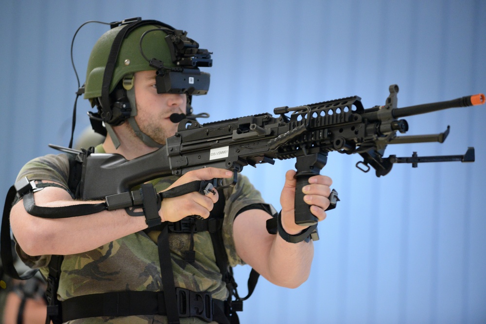 Soldiers from the Netherlands army conduct training in a Dismounted Soldier Training System at the 7th US Army Joint Multinational Training Command