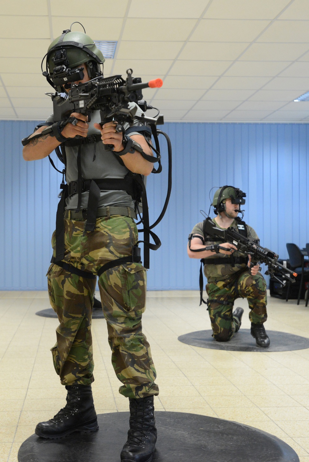 Soldiers from the Netherlands army conduct training in a Dismounted Soldier Training System at the 7th US Army Joint Multinational Training Command