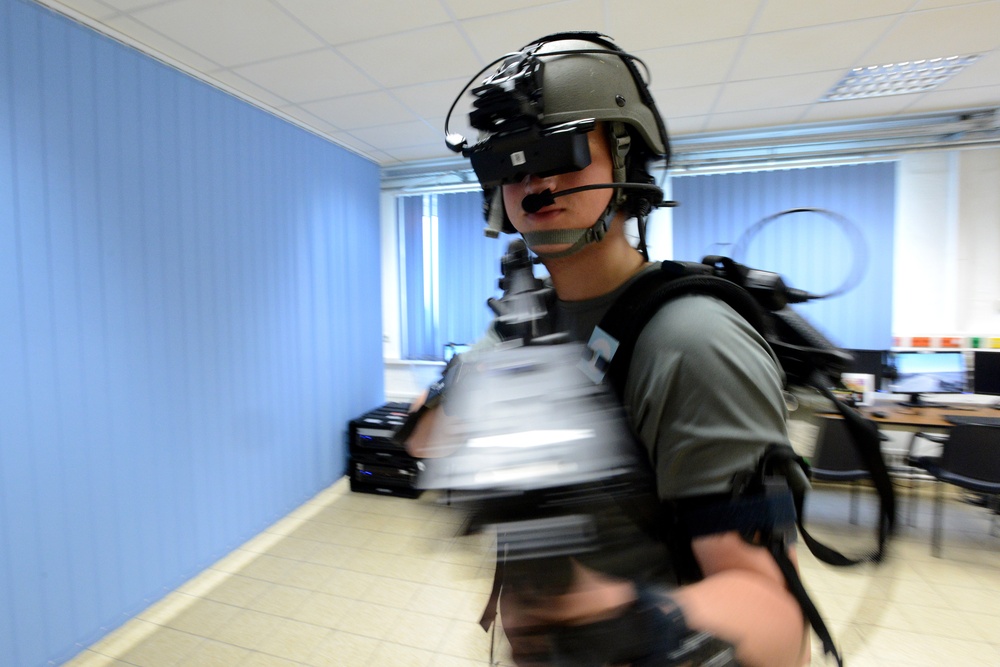 Soldiers from the Netherlands army conduct training in a Dismounted Soldier Training System at the 7th US Army Joint Multinational Training Command