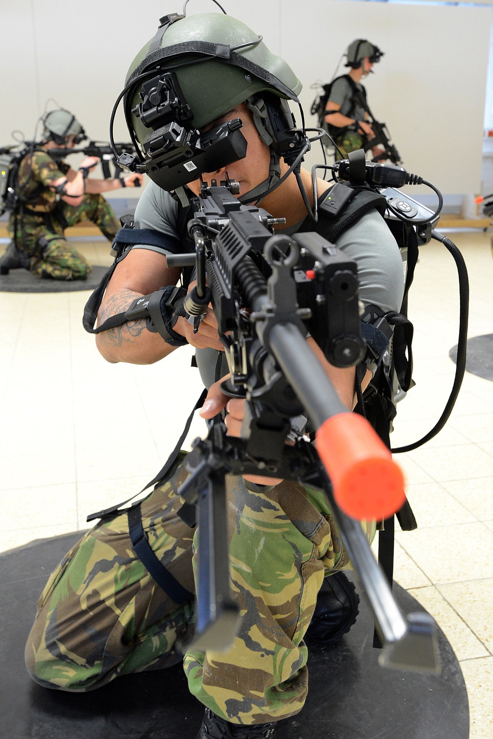 Soldiers from the Netherlands army conduct training in a Dismounted Soldier Training System at the 7th US Army Joint Multinational Training Command