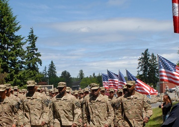 Soldiers return to handshakes, embraces