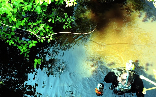 Inspectors dive under bridges, look for cracks