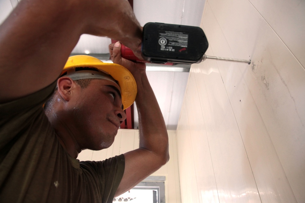 Joint Task Force Jaguar soldiers build school